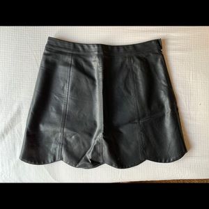 Black leather mini skirt